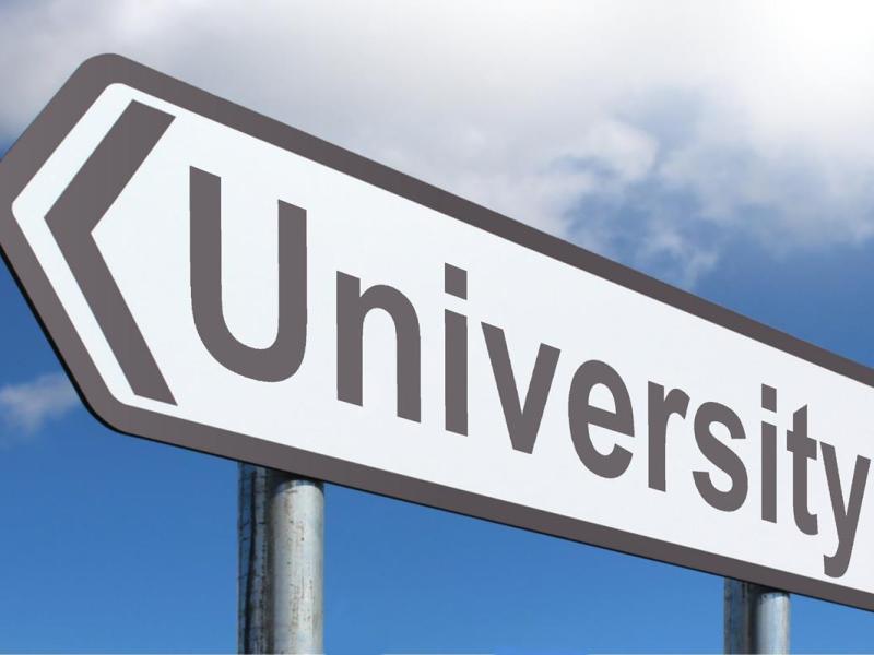 sign that says university on a blue sky